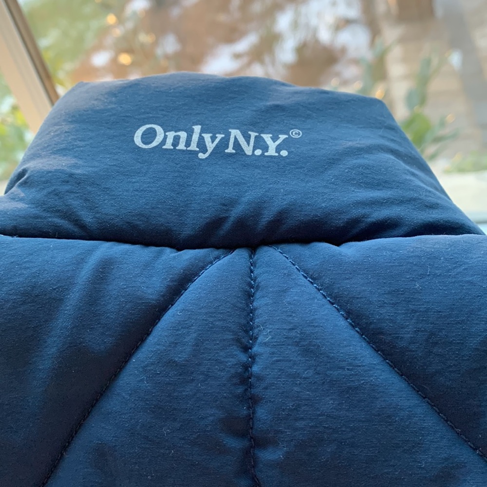 OnlyNY puffy vest: unisex Size Small; blue w/orange interior